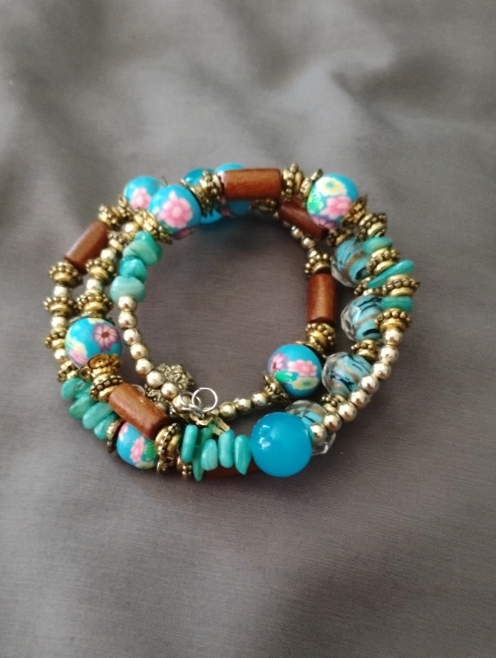 Turquoise Beaded Coil Bracelet with Floral Accents